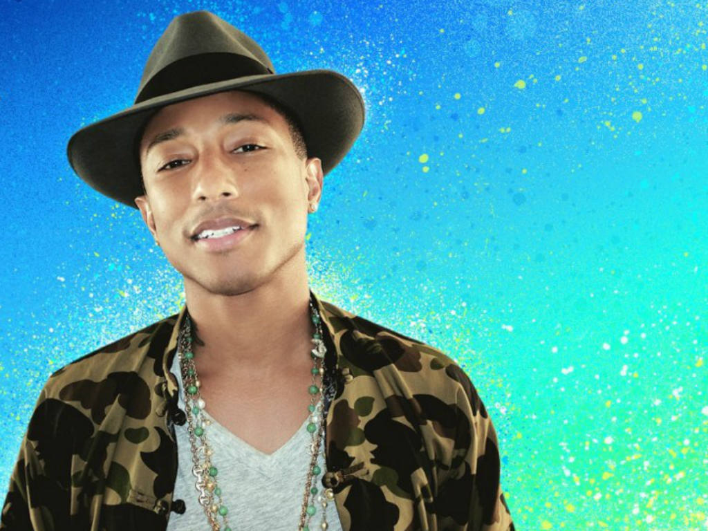 Pharrell Williams como uno de los invitados en el Apple Music Festival. 