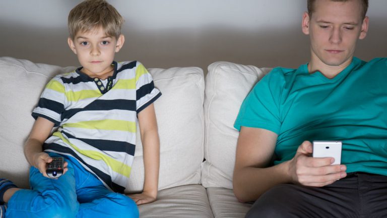 http://www.shutterstock.com/pic-243712897/stock-photo-dad-and-son-addicted-to-modern-technology.html
